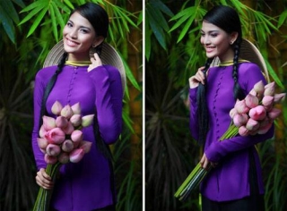 Người đẹp còn tăng thêm nét Việt bởi cách sử dụng nón lá và hoa sen cầm tay, cả hai trở thành điểm nhấn hoàn hảo.