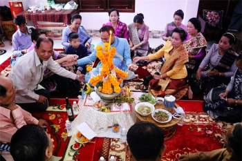 Độc đáo phong tục cưới xin của người Lào, cô dâu chú rể động phòng ở nhà gái - Ảnh 3.