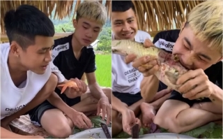 Hình ảnh các thanh niên ăn cá sống khiến nhiều người sợ hãi.