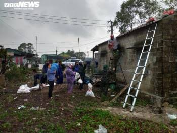 Ảnh: Quảng Trị, Huế chạy đua gia cố nhà, sơ tán dân trước giờ bão số 13 đổ bộ - 6