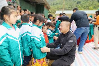 Báo Gia đình và Xã hội tổ chức Chương trình Xuân ấm biên cương đến người dân vùng núi - Ảnh 7.