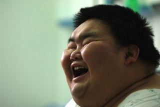 Cuộc sống của người đàn ông béo nhất Trung Quốc sau khi giảm cân - Ảnh 1.