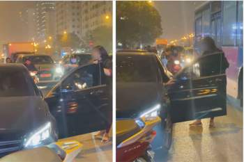 Người phụ nữ chặn xe Mercedes giữa đường phố Hà Nội nghi do bị bạn tốt cướp chồng, cú đá của cô gái trẻ từ ô tô gây chú ý - Ảnh 1.