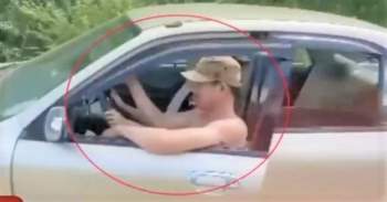 Danh tính đôi nam nữ trong clip ngồi chung ghế lái ô tô lao vun vút trên đường - Ảnh 1.