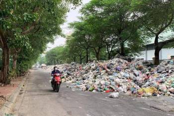 Hà Nội: Chỉ đạo đảm bảo đời sống người dân quanh khu xử lý rác Sóc Sơn - Ảnh 1.