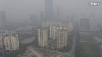 Hà Nội ô nhiễm không khí nghiêm trọng, bầu trời mờ đục vì khói bụi - Ảnh 3.