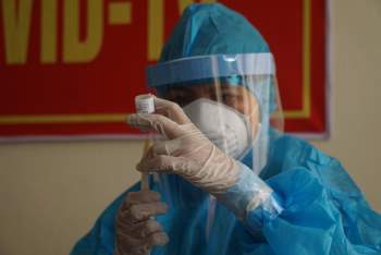 Hơn 35.000 người Việt Nam đã tiêm vắc xin phòng Covid-19 - Ảnh 1.