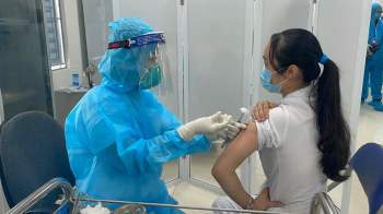 522 người Việt Nam đã tiêm vắc xin COVID-19; ghi nhận một số phản ứng thông thường đã được khuyến cáo - Ảnh 1.