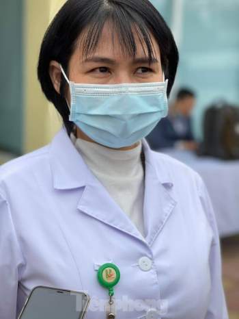 Những mũi tiêm vắc xin COVID-19 đầu tiên tại Hà Nội, Hải Dương và TPHCM - ảnh 16