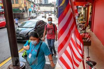 Malaysia ban bo tinh trang khan cap, Indonesia them 6.800 ca mac moi hinh anh 1