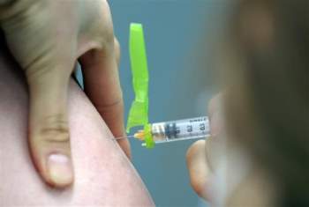 Lao: Da tiem vaccine ngua COVID-19 cho 85% doi tuong dot 1 hinh anh 1